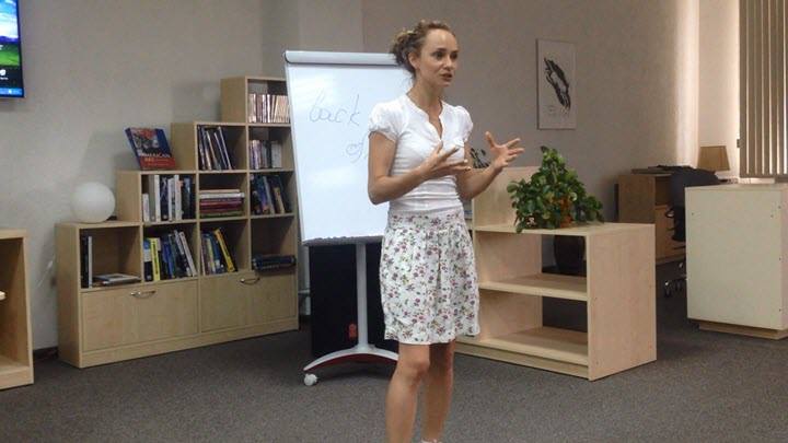 Alesya Teplyakova, a translator from Minsk, is giving her public speech in the libruary